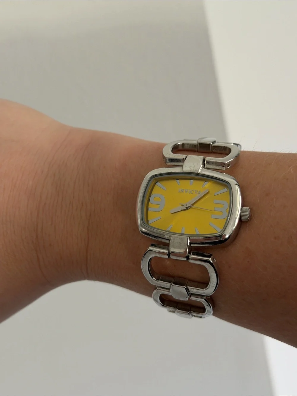Vintage Invicta Silver Watch with Yellow Dial
